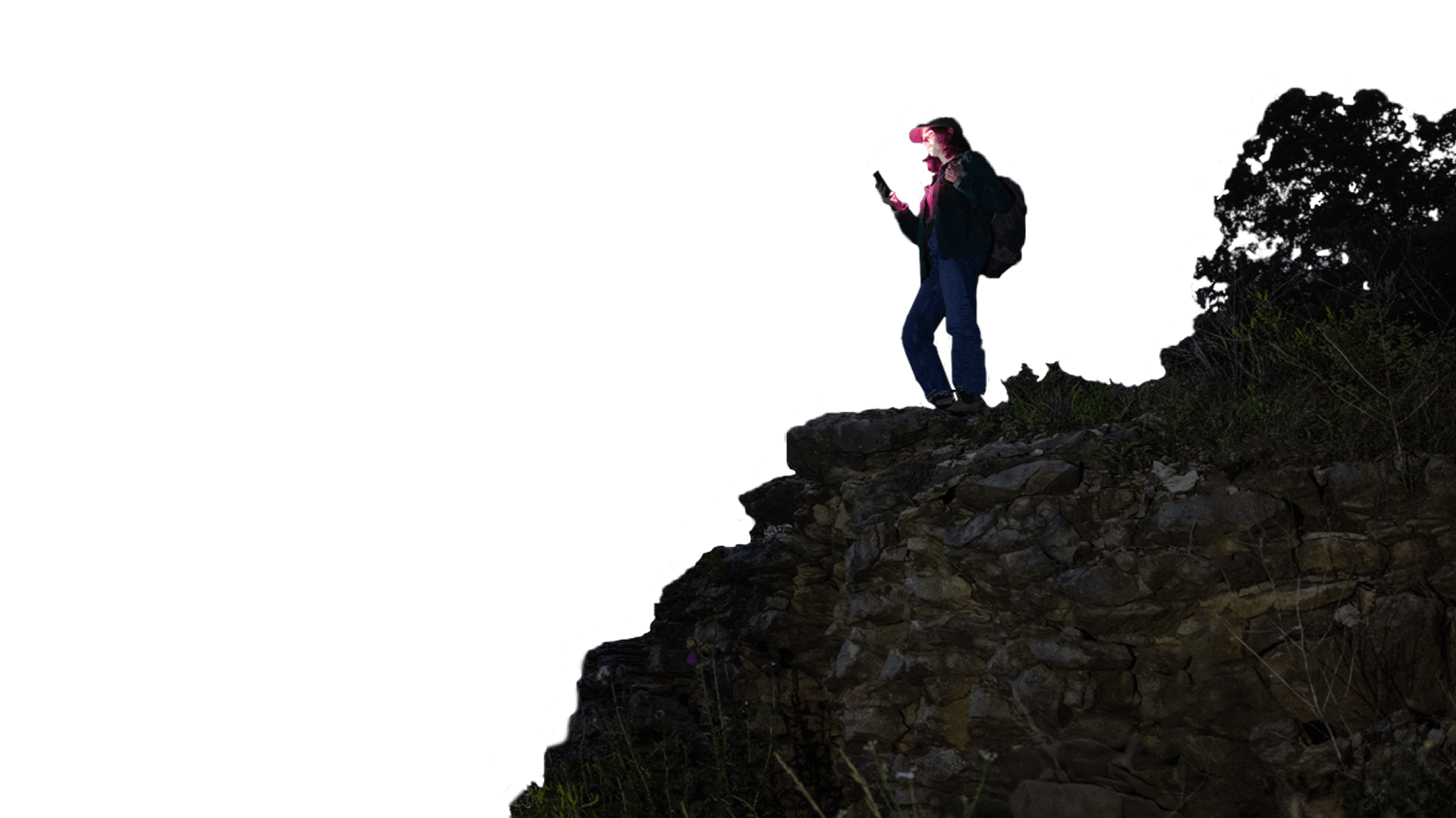 Woman looking at her phone from a mountain summit under a starry night sky and an array of magenta satellites in the sky